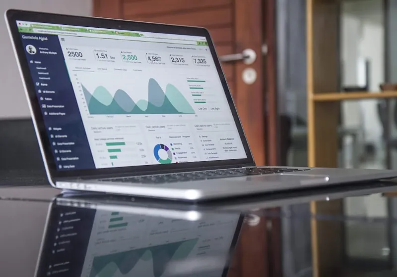 Laptop showing analytics dashboards, reflecting long-term confidence in the Dynagest profile